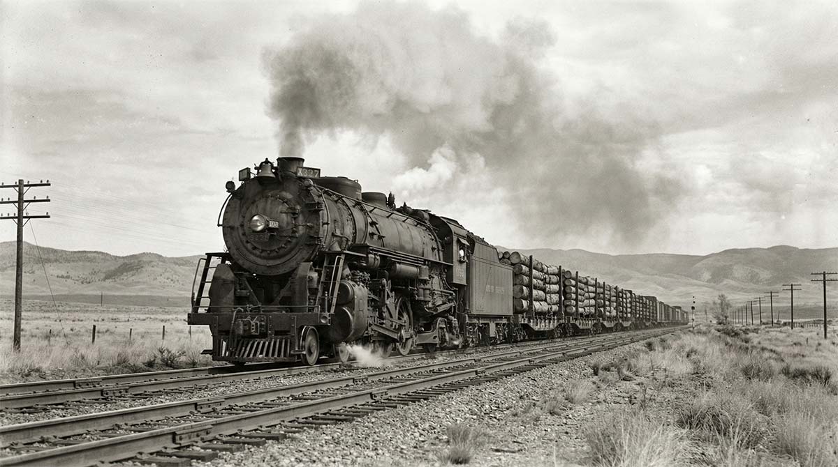 Artist render of a 1940's era freight train carrying timber across the Southwest US circa 1940.